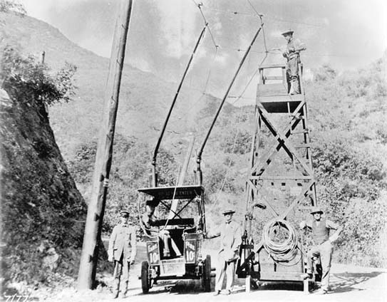 The trolley was actually a large automobile (1912 Oldsmobiles) converted to run on an electric engine connected to overhead wires, which frequently dislodged. It had an approximate 10-passenger capacity. After about 5 years of traveling up and down the treacherous narrow road, the poor old trolley buses fell apart. Courtesy: waterandpower.org