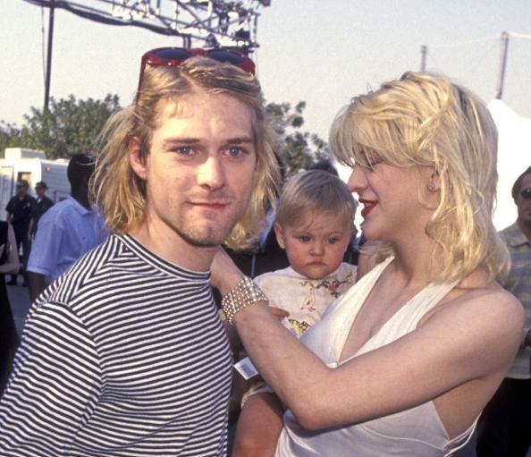 Kurt and Courtney Cobain, with baby France